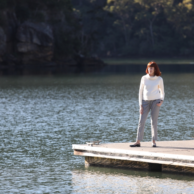 Woman looking over water